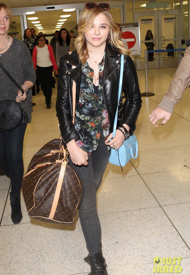 Chloe Grace Moretz spotted with her Louis Vuitton luggage as she touches  down at Charles-de