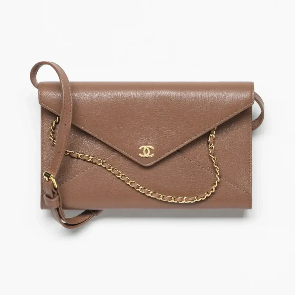 Chanel clutch with leather strap grained goatskin gold tone metal AP5232B23916U8391