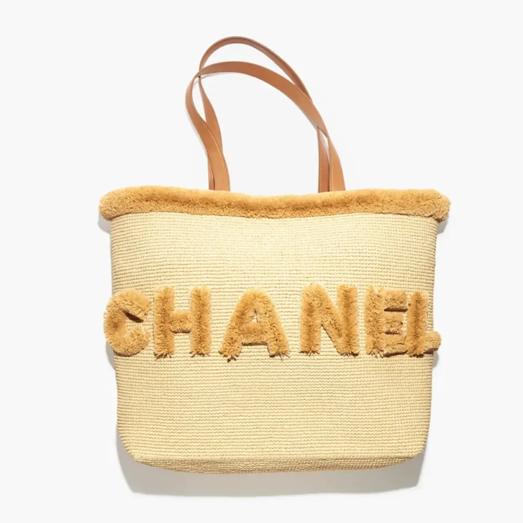 Chanel maxi shopping bag braided raffia gold tone metal AS6173B23740U8547