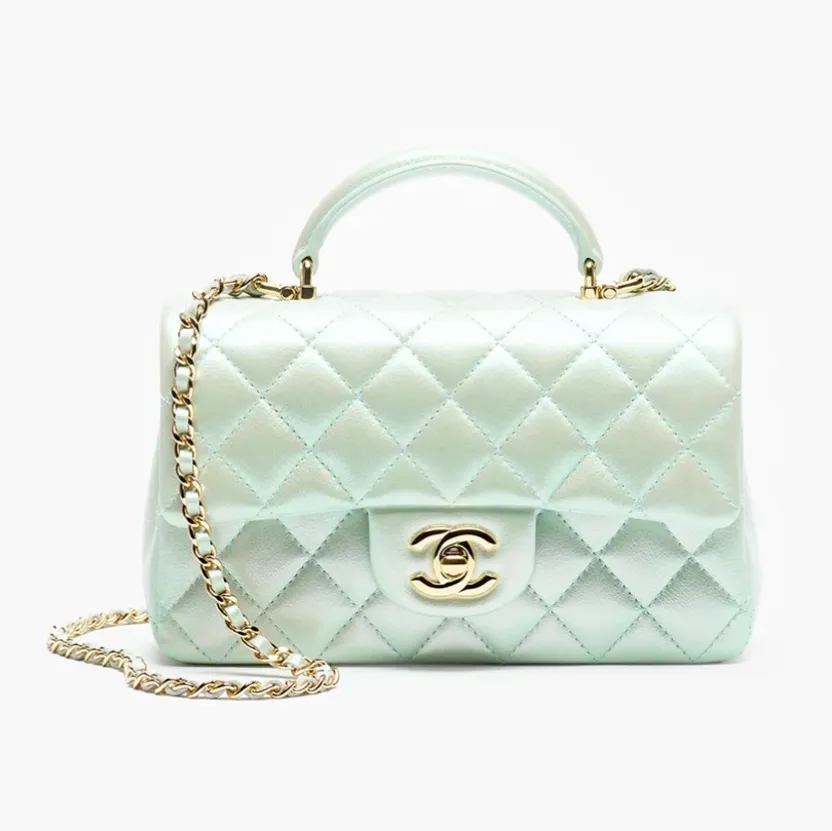 Chanel mini classic handbag with top handle iridescent calfskin gold tone metal AS2431B26357UE210